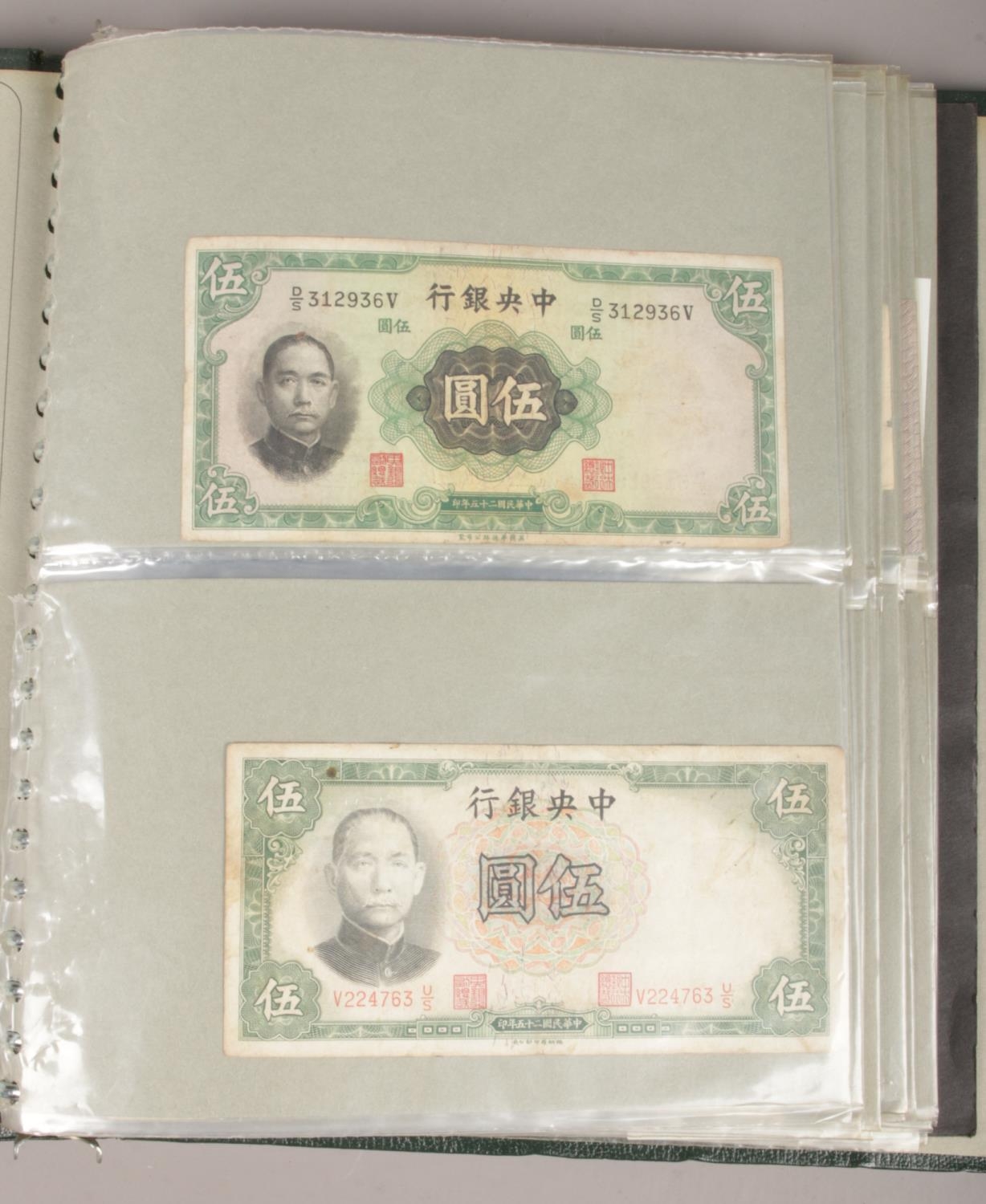 An album of British and world bank notes. Includes Chinese, Portuguese, South African, German etc.