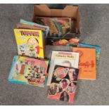 A box of comics and annuals. Includes Topper, Beezer, Bunty For Girls etc.