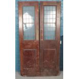 A pair of mahogany doors. With lead glazed glass windows. (203cm x 54cm)