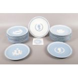 A collection of Wedgwood blue Jasperware Christmas and Commemorative plates. To include Christmas
