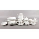 A twenty one piece white and gilt edge coffee/dinner set. To include coffee pot, cups, saucers,
