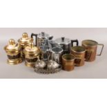 A four piece chrome tea set, alongside copper 'grain' mugs and white metal cruet set of birds in a