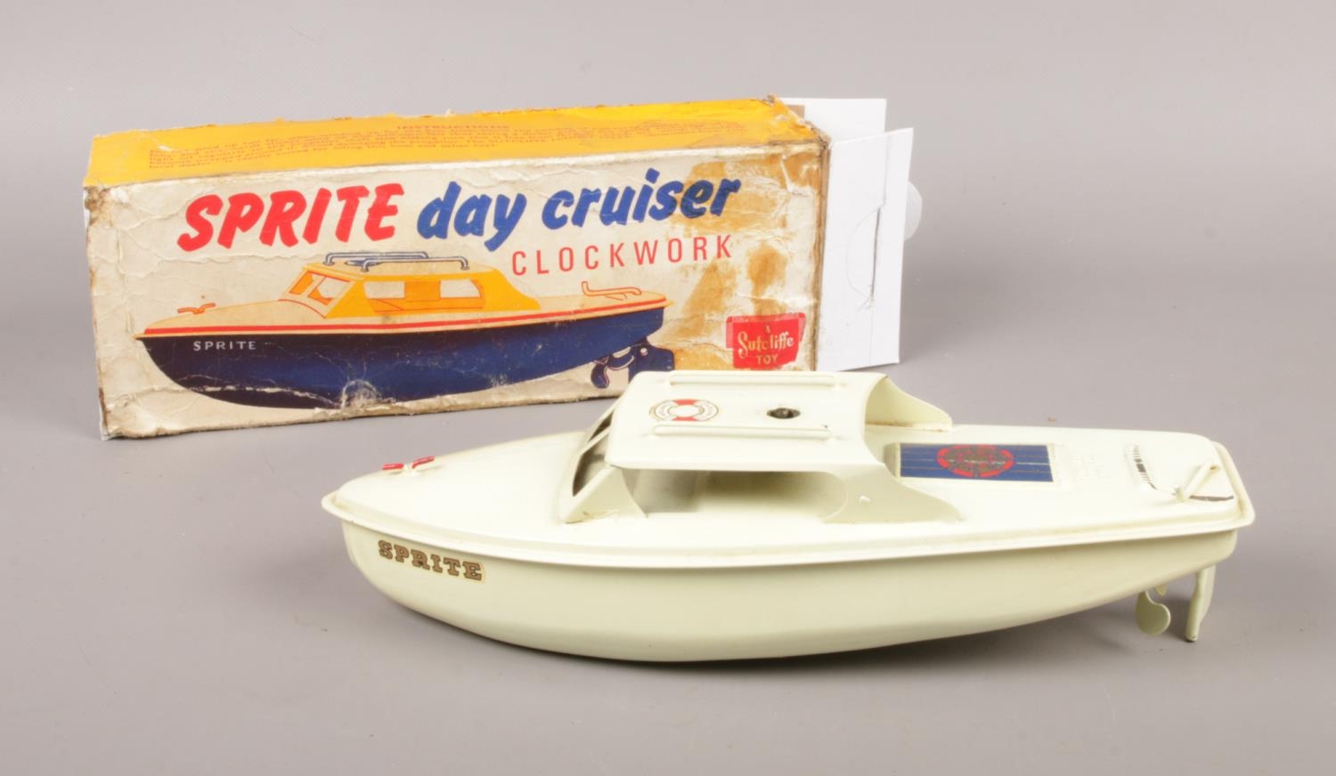 A boxed Sutcliffe Sprite day cruiser clockwork model boat.