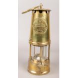 An Eccles Type 6 brass miners safety lamp.