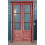 A pair of painted pine doors with matching frame. Each door has three glass panels. Frame size (