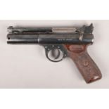 The Webley Premier 'B' .22 cal air pistol, with brown chequered Bakelite handle. Some slight