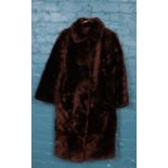 A vintage ladies long fur coat. no labels on approx size medium