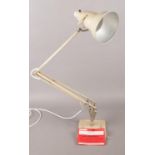 A Herbert Terry & sons angle poise desk lamp. Raised on stepped base. Model No. 90.