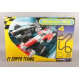 A boxed Scalextric F1 Super Teams set.