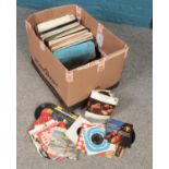 A box of LP and single records. Includes Country, Easy Listening, Classical etc.