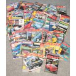 A box of sport car magazines. Including Top Wheels, Fast Car, World Sports Cars, etc.
