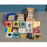 Three boxes of pop singles (45rpm). Artists to include The Housemartins, Rick Astley, The Beatles,