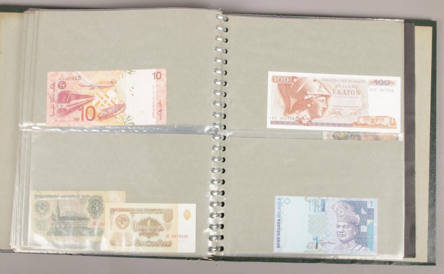 An album of British and world bank notes. Includes Chinese, Portuguese, South African, German etc. - Image 3 of 5