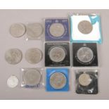 A collection of commemorative coins. To include silver jubilee, Churchill and Charles and Diana