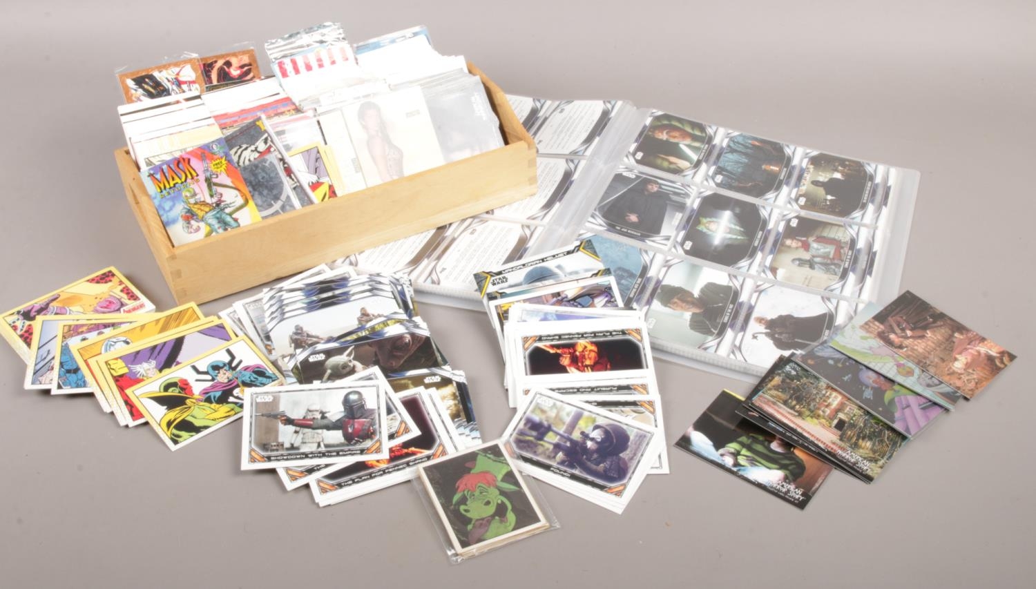 A quantity of collectors cards. Star Wars, American Horror story, Disney Beauty & the beast 101