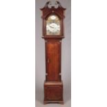 A George III oak longcase clock by John Huggin, Ashwell Thorp. The brass 12inch dial having Roman