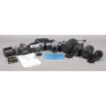 A quantity of mainly Olympus camera equipment. To include Trip 35 and case, OM10 camera fitted