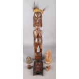 A quantity of treen. Including large tribal figure, brass inlaid trinket box, mask, etc.