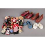 Four pairs of vintage baby's and children's leather shoes, with a quantity of dolls from 1950'&