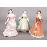 Three Royal Doulton porcelain figures of ladies. Includes Amy HN3854, Elegance HN2264 and Julia