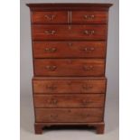 A George III mahogany and pine chest on chest. With moulded cornice and bracket feet. Height