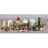 A box of mostly alcohol miniatures. Including Whiskey, Liqueur, Wade Johnnie Walker jug, etc.