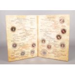 A coin collection of The History of Our Monarchy in album.