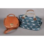 Two designer handbags. To include a 'Joules' leather 'Saddle' bag and a 'Brakeburn' sausage dog