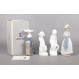 A selection of named ceramics. To include a boxed Lladro figure of a kneeling nun, two Spode figures