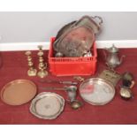 A box of metalwares. Including candlesticks, trays, horn handle flatware, tankards, etc.