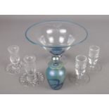 A small quantity of glassware. Includes Adrian Sankey pedestal bowl, two pairs of candlesticks and