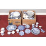 Two boxes of blue & white ceramics. Including Old Willow, Churchill, Burleigh ware, Wood's, etc.