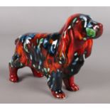 An Anita Harris Pottery figure of a dog.