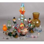 A quantity of glassware. Including Murano style glass clowns, art glass animals, etc. Largest