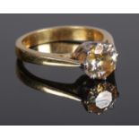 An 18ct gold moissanite solitaire ring. Stone approximately 1.25carat. Size J. 3.88g. Stone