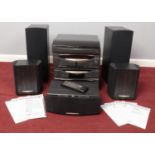A Kenwood stacking stereo system. Includes turntable, AV surround receiver, stereo cassette deck,