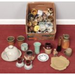 A box of stoneware. Including jugs, vases, figures, dish with cover, etc.