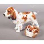 Two Royal Doulton porcelain figures of dogs. HN2585 and HN1002.