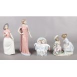 Four NAO by Lladro figures, to include 'He loves me' (1304) and 'Stories with Grandma' (1512).