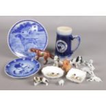 A collection of dog themed ceramics. Includes Royal Crown Derby pin dishes, Royal Copenhagen cabinet