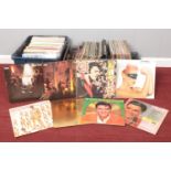 Three boxes of LP vinyl records. Elvis, Bruce Springsteen, Jim Reeves etc