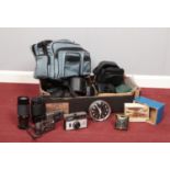 A box of assorted photographic equipment and clocks. To include Ilfordmatic Super 100, a Hahnel HC-