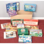 A box of board games. Including Monopoly, Cluedo, Connect 4, etc.
