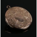 A 9ct gold circular locket pendant/brooch. Gross weight 5.7g.