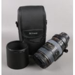 A Nikon ED AF VR-Nikkor 80-400mm f/4.5-5.6D lens. With Jessops Skylight 1A filter, in Nikon soft