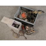 A box of mainly metalwares. Includes meat grinder, silver plated dressing table items, horse