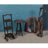 A collection of assorted furniture. To include carved hardwood tripod table and three tier cake