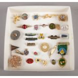 A selection of twenty nine vintage brooches and pin badges. To include LNER 'Mayflower', Royal