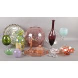 A box of coloured glassware. Including large sphere vase with painted dragonflies, Murano style