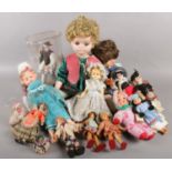 A collection of vintage dolls. Rosebud Mattel doll, Vintage peg dolls, Russian dolls, Evergreen etc